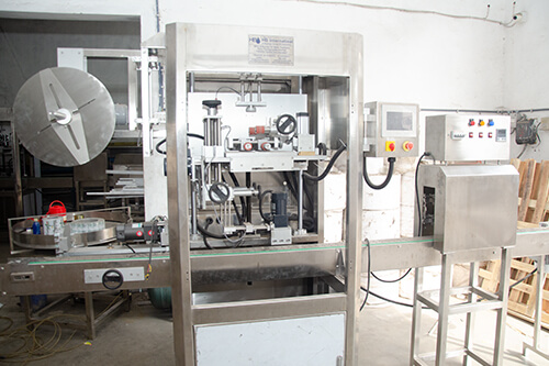 Cap Sleeve Applicator Machine